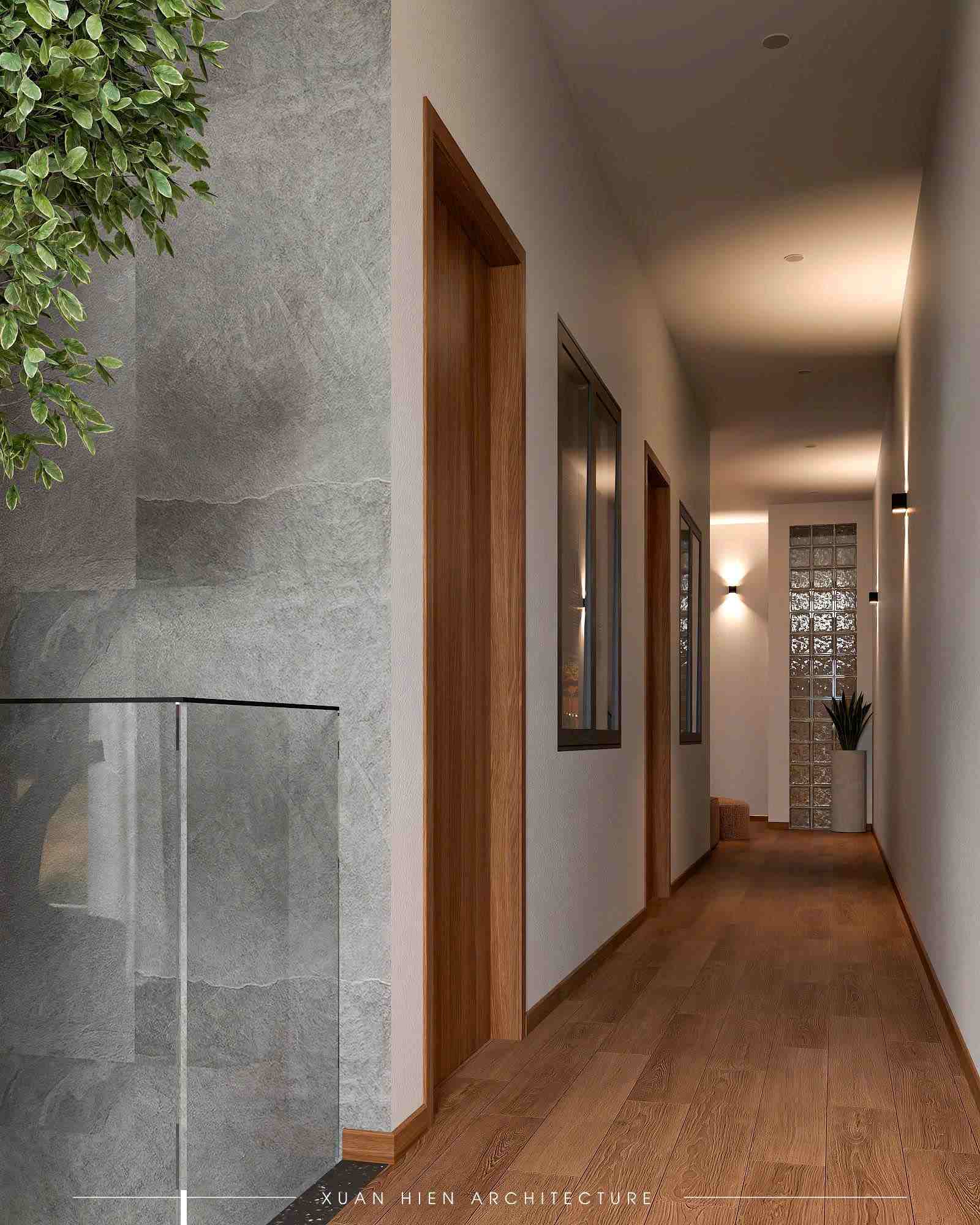 Hành lang rộng rãi, thông thoáng với ánh sáng tự nhiên và điểm nhấn cây xanh trang trí